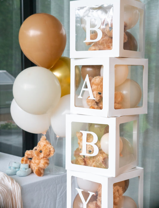 Clear boxes with BABY letters - fill with balloons, or party decorations